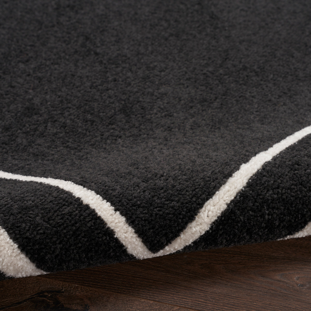 Nourison Essentials NRE02 Black Ivory Rug