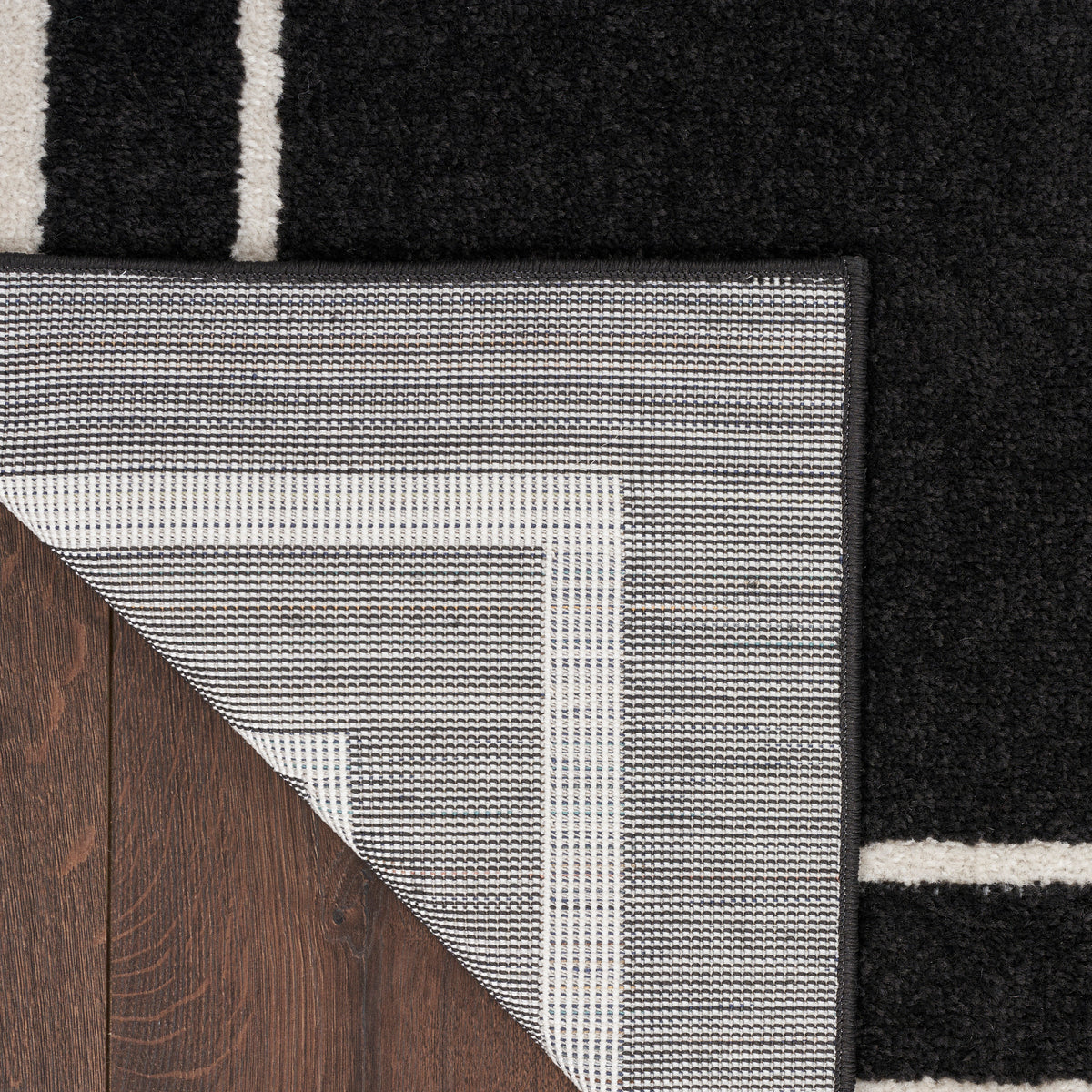 Nourison Essentials NRE02 Black Ivory Rug